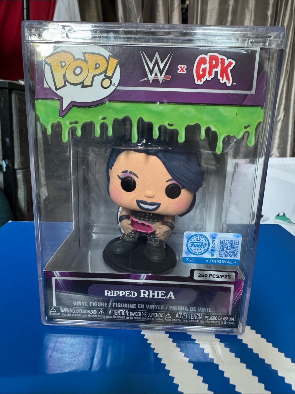 Funko Pop Ripped Rhea Vinyl Figure - Black Hair, Purple Outfit, Pink Accent